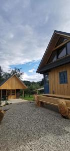 a building with a bench in front of it at iDILe in Râșca