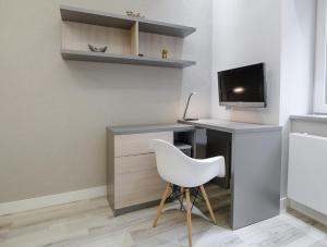 Telewizja i/lub zestaw kina domowego w obiekcie MaVa Apartments