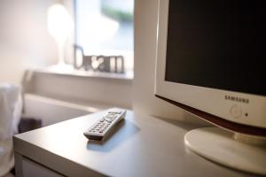 Telewizja i/lub zestaw kina domowego w obiekcie MaVa Apartments