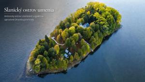 an island in the middle of the water at Penzion Kormoran in Námestovo +90 photos