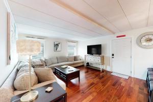 a living room with a couch and a table at White Marlin 202A in Ocean City