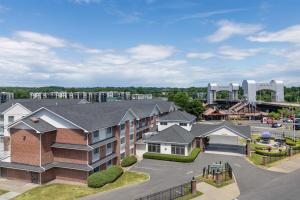 an aerial view of a apartment complex with houses at Best Western PLUS Franklin Square Inn in Troy