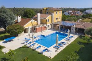 an aerial view of a villa with a swimming pool at Villa Suzanne in Banjole