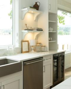 a kitchen with a sink and a dishwasher at The Point on Wood Lake in Lake Country