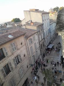 an overhead view of a city street with buildings at Chambre Palais des Papes Avignon in Avignon