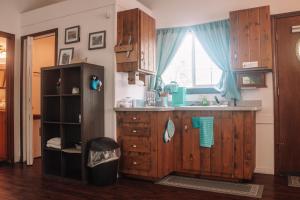 a kitchen with a sink and a window at Coastal Studio in Brookings
