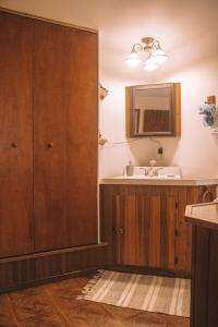 a bathroom with a sink and a mirror at Coastal Studio in Brookings +13 photos