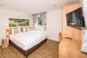 Letto o letti in una camera di Appartements AUSZEIT with private SPA