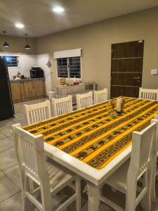 a dining room with a table and chairs at Finca Las Marías in Cardozos