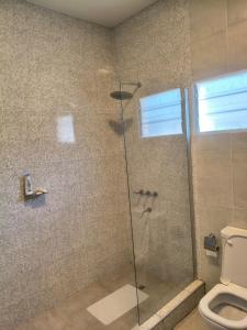 a bathroom with a shower with a toilet at Finca Las Marías in Cardozos +14 photos