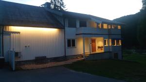 a house with a light on the side of it at Two bedroom Apartment 80m2 2nd floor in Bagn
