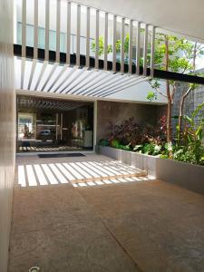 an external view of a house with a staircase at Departamento en Monné in Mérida
