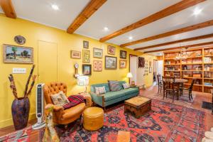a living room with a couch and a table at Idyllwild Glory Days in Idyllwild