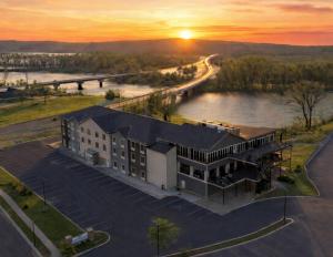an aerial view of a building next to a river at Waterfront Hotel in Prairie du Chien