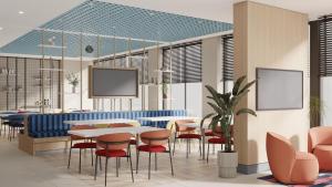 a dining room with a table and chairs at Holiday Inn Express Yalova by IHG in Yalova