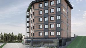 a rendering of a tall brick building at Holiday Inn Express Yalova by IHG in Yalova