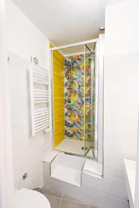 a bathroom with a shower with a glass window at Annalì in Trentinara +33 photos
