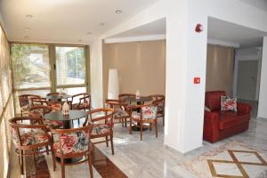 Posezení v ubytování Elements Rooms & Apartments