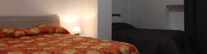 Posteľ alebo postele v izbe v ubytovaní Triathlon B&B