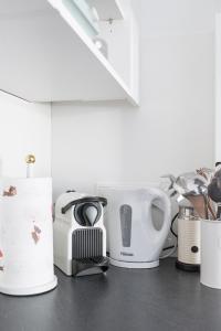 a kitchen counter top with a toaster and a toaster at Pirkners Home in Sooss