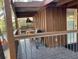 a view from the deck of a cabin at The Last Resort in Ruidoso
