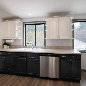 a kitchen with white cabinets and a stainless steel dishwasher at Remodeled, Spacious, Modern Retreat 5 BR, 3BA, 2KIT in Shoreline