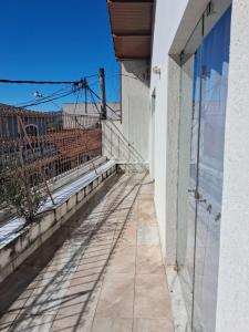 a balcony with a view of the city at Apartamento Solaris in Cunha