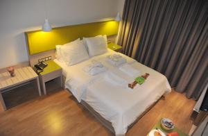 Postel nebo postele na pokoji v ubytování Elements Rooms & Apartments
