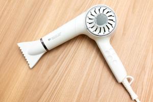 a hair dryer sitting on top of a wooden table at Marroad Inn Akasaka in Tokyo