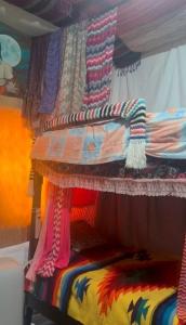 a bedroom with a bed with a canopy at My Little Hostel in Monterrey