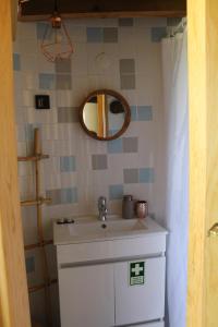 a bathroom with a sink and a mirror at Penacova Moinho do Ligeiro near Coimbra in Penacova +20 photos