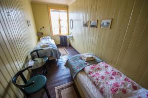 Postel nebo postele na pokoji v ubytování Einarshúsid Guesthouse