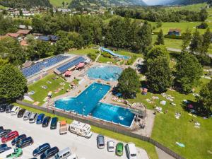 an aerial view of a resort with two swimming pools at Apartment in Mittersill near Ski Slopes in Mittersill