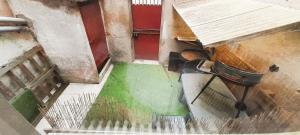 an overhead view of a staircase in a building at Le Silodort - 7 pers - wifi - cour in Vatan
