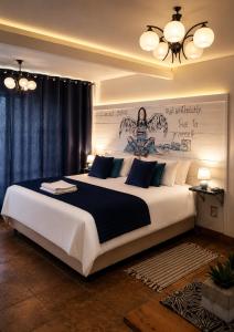 a bedroom with a large bed with a poster on the wall at Be Our Guest Self Catering in Nelspruit