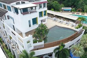 an aerial view of a house with a swimming pool at Ao Nang Colors Hotel - Aonang Beach in Ao Nang Beach