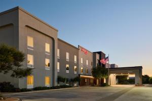 a rendering of the front of a hotel at Hampton Inn by Hilton Odessa in Odessa