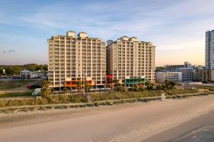 a view of two tall buildings near a beach at Hampton Inn & Suites Myrtle Beach Oceanfront in Myrtle Beach