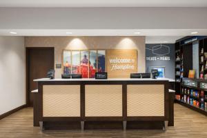 a store with a counter in a store at Hampton Inn & Suites - DeLand in De Land
