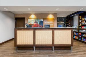 a store with a counter in a store at Hampton Inn & Suites - DeLand in De Land