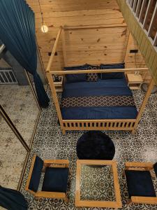 an overhead view of two beds in a room at The jungle tales in Bhīm Tāl +23 photos