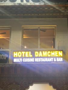 ein Schild an der Seite eines Zuges in der Unterkunft Hotel Damchen in Phuentsholing
