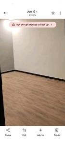 a screenshot of an empty room with a wooden floor at Hayatabad Heights1 in Peshawar
