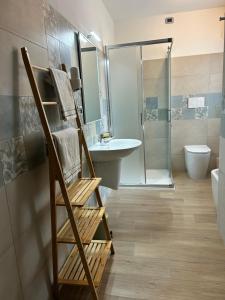 a bathroom with a shower and a sink and a toilet at Residenza La Ciasa in Claut +46 photos