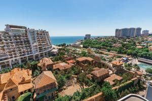 an aerial view of a city with buildings and the ocean at Arcadia Sea Breeze in Odesa