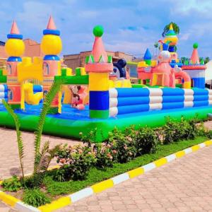 a large inflatable playground in a park at Chris Hotel in Runda