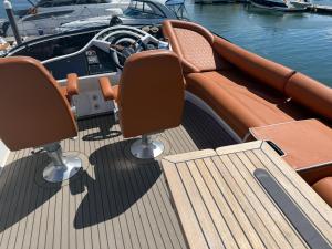 a deck of a boat with two seats on it at The North Bank in Poole +2 photos