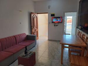 a living room with a couch and a table at HASH # SAAd in Marsa Matruh