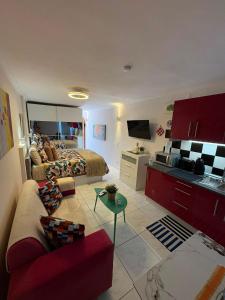 a large living room with a bed and a couch at Nice Studio Apartment with Ocean View in Arguineguín