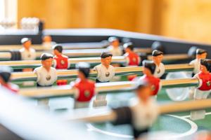 a group of toy people sitting at a table at Ferienhaus Traum Teufel in Hettingen